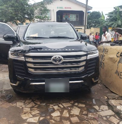 Black Toyota Land Cruiser LC300 with chrome grille upgrade