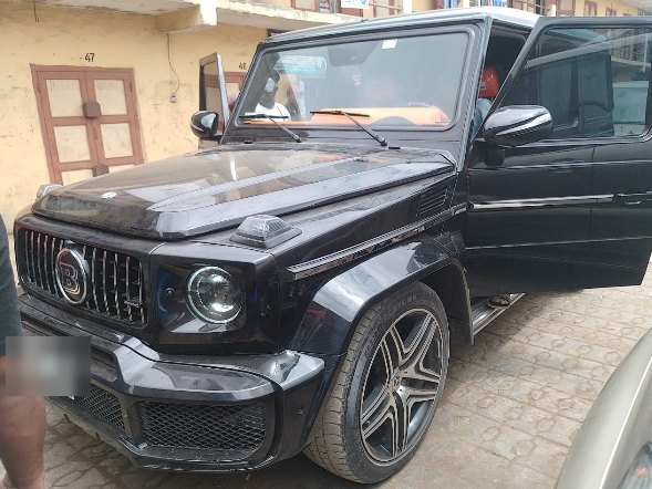 Black Mercedes-Benz G-Class with custom orange leather interior
