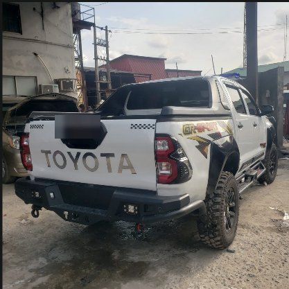 White Toyota Hilux GR-Sport with upgraded rear bumper